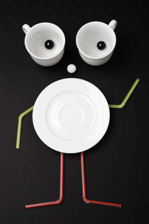 Funny food doll made with cups and dish.の写真素材