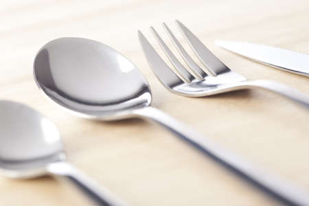 Group of silveware with spoons, fork and knife.の写真素材