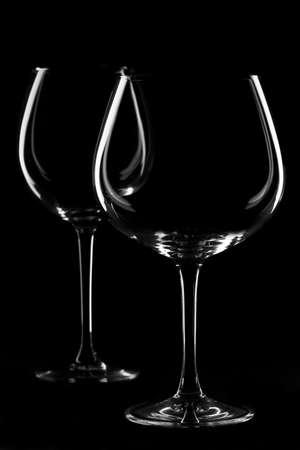 Two perfect black cups on a black background.の写真素材