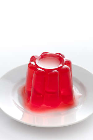 Strawberry gelatin on a dish with white copy space in upper side.の写真素材