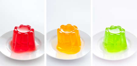 Three gelatins (red, orange and green) making a traffic light.の写真素材