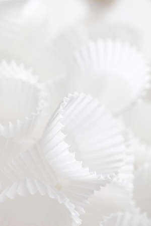 Bunch of cupcake liners with selective focus.