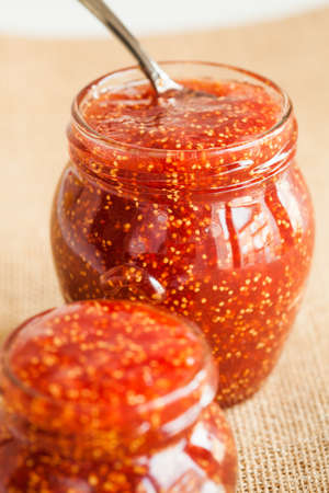 Fresh fig jam on it's pot.の写真素材