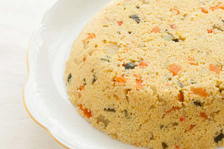 Fresh couscous cake. Macrobiotic and healthy dish.の写真素材