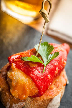 Typical spanish stuffed pepper called "pimientos del piquillo" tapas.の写真素材