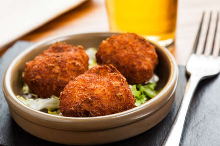 Fish fritters wit beer glass.の写真素材
