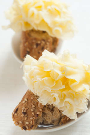 Two snacks of Tete de Moine french cheese.