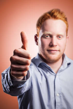 Young entrepreneur making the okay sign.