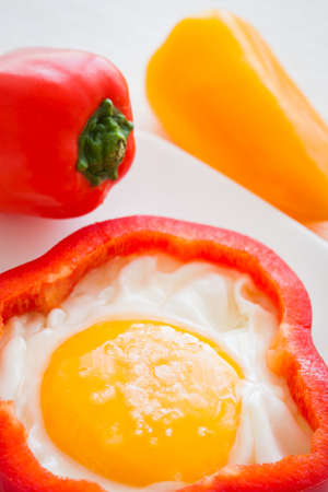 Fresh peppers with fried egg and salt.の写真素材