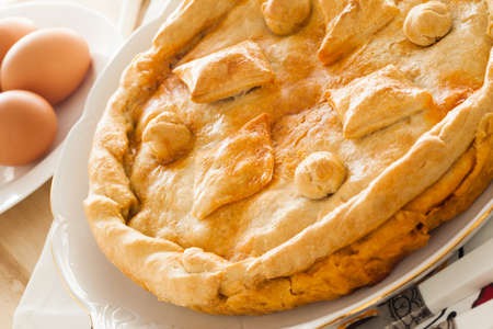 Homemade meat pie fresh from the oven, ready to eat.の写真素材