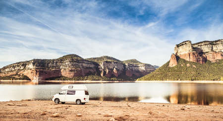 Motorhome camped in natural reservoir of Sau Lake. Osona.の写真素材