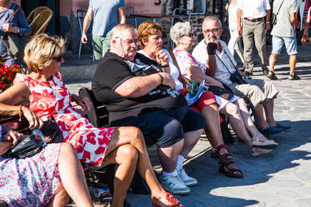 COLLIURE - SEPTEMBER 14: Tourists relax in the beach in the small village of Colliure, south France. September 14, 2013 Colliure, France.のeditorial素材