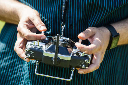 Hands in remote controller for drive a Drone.
