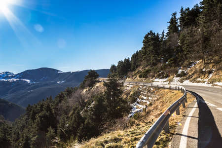High mountain road in a sunny day.の写真素材