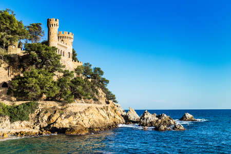 Landscape of Lloret de Mar Castle and its beach in a sunny afternoon.のeditorial素材