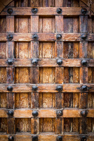 Old castle door texture with faded wood.の写真素材