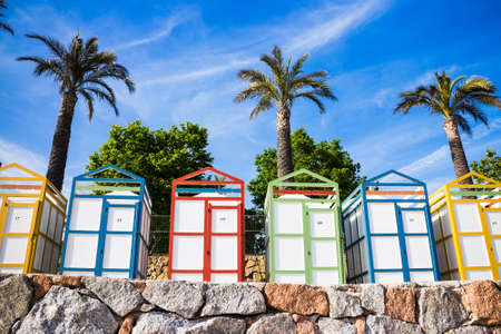 Landscape of typical colorful beach houses of Sagaro, Costa Brava.の写真素材