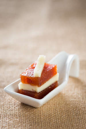 Delicious snack: fresh quince with cheese.の写真素材