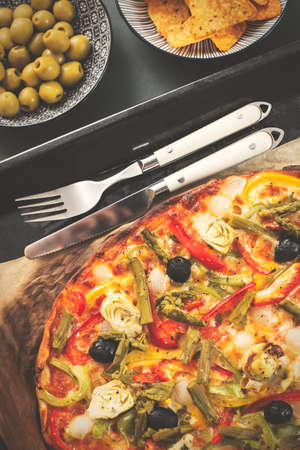 Top view of a healthy vegetables pizza. Vintage edition.の写真素材