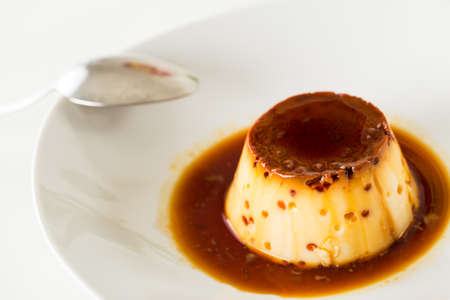 Delicious homemade flan in white 