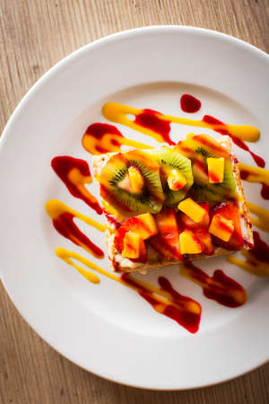 Puff pastry fruit cake in a wooden table