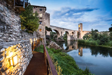 Night landscape of medieval village of Besalu from the river, Costa Brava. Spain.のeditorial素材
