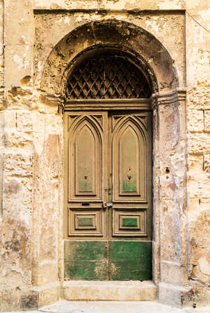 Old and rust Maltese door.の写真素材