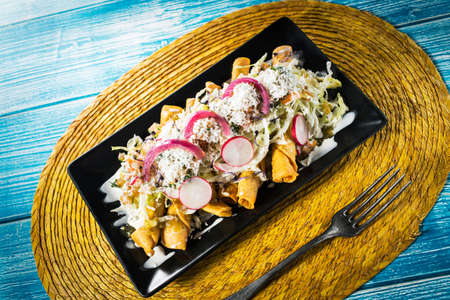 Delicious mexican flautas, coyoacan style. Authentic meixcan food.の写真素材