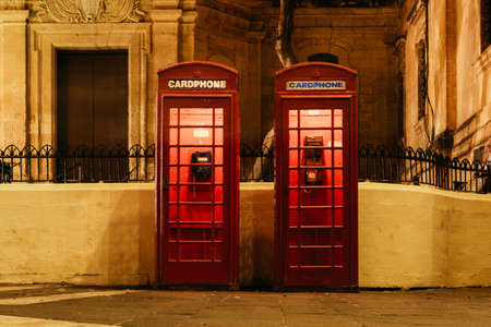 Typical red telephone cabin in Malta.の写真素材