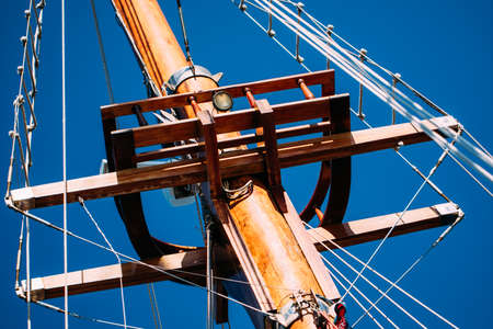 Old wood ship mast detail in a sunny day.の写真素材