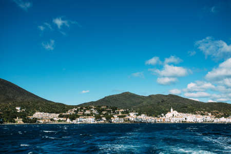 Panoramic landscape of Cadaques from the sea in a sunny day. Spain.の写真素材