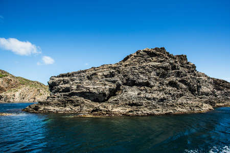Cap de Creus coast landscape from the sea. Spain.の写真素材