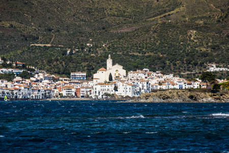 Panoramic landscape of Cadaques from the sea in a sunny day. Spain.の写真素材