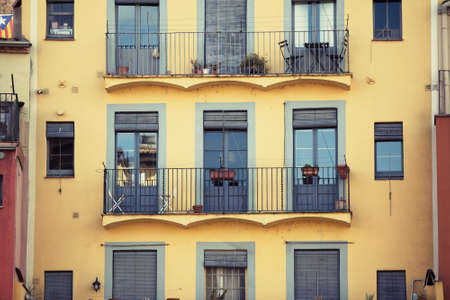 Traditional colorful facades of Onyar River in Girona.の写真素材