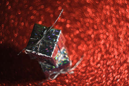 A shiny gift with bokeh in a retro style.の写真素材