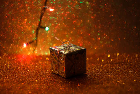 A shiny gift with bokeh in a retro style.