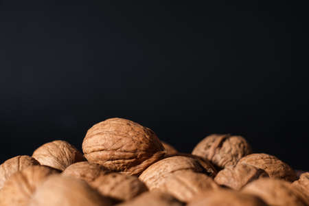 Walnuts on a dark background. Nutcracker close-up.の写真素材