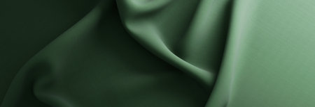 Elegant drapery of delicate green fabric.の写真素材