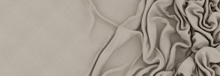 Elegant drapery of delicate beige fabric.の写真素材