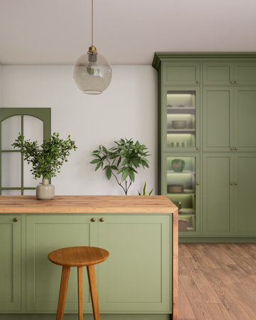 Beautiful modern green kitchen with minimalist decor and natural elementsの写真素材