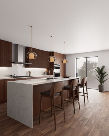 The modern design of the kitchen is characterized by elegance and abundant natural lighting for a cozy atmosphereの写真素材