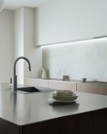 This is a modern kitchen that showcases minimalist design along with sleek and elegant finishesの写真素材