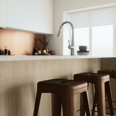 Check out the modern kitchen design with stylish bar stools that will create a chic and cozy atmosphereの写真素材