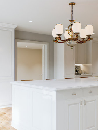 Kitchen white countertop with white marble, with blurred bokeh background.の写真素材