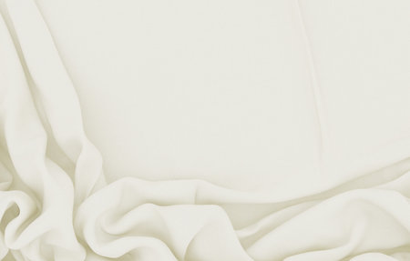 Delicate white fabric with soft folds.の写真素材