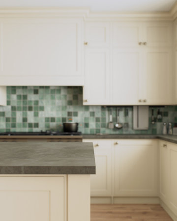 This is a stylish and modern kitchen, decorated with beautiful green accents and an open layoutの写真素材
