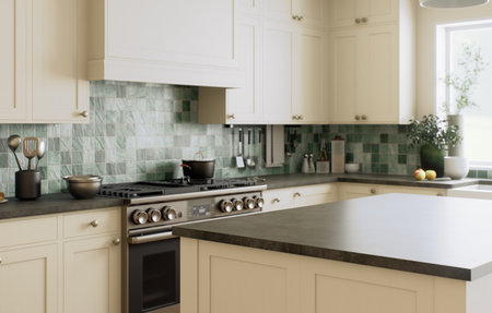 This is a stylish and modern kitchen, decorated with beautiful green accents and an open layoutの写真素材