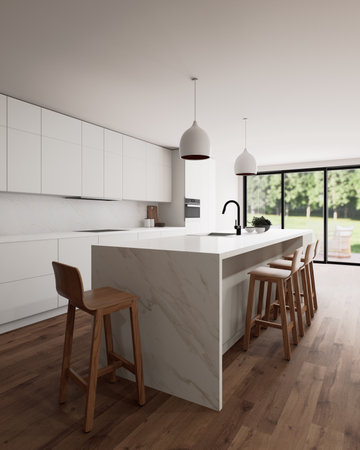 A beautiful modern kitchen interior featuring abundant natural light and a spacious, open layoutの写真素材