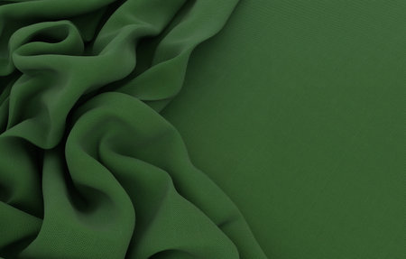 Elegant drapery of delicate green fabric.の写真素材