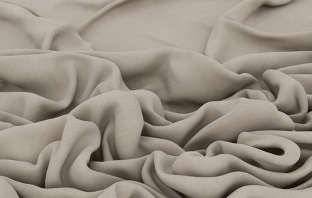 Elegant drapery of delicate beige fabric.の写真素材